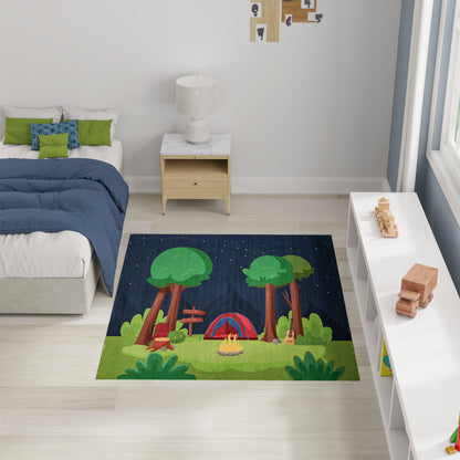 Kids' rug with a camping scene: tall trees, a red tent, a small campfire, and green grass under a dark starry sky.
