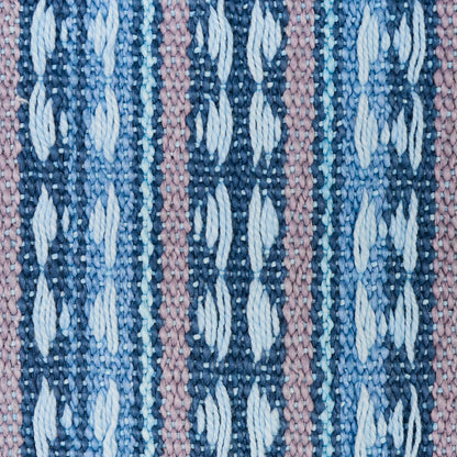 Close-up of a blue-toned striped woven fabric; textured weave with visible fibers.