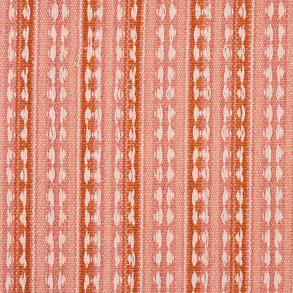 Orange & white striped woven fabric with vertical rope-like motifs & oval accents; boho textile for upholstery or apparel.