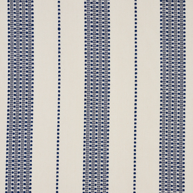 Beige woven fabric with navy-blue dotted vertical stripes; classic striped textile pattern for upholstery or rug.