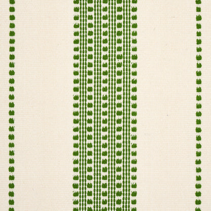 Cream woven fabric with narrow vertical rows of green dotted stripes; geometric textile for home decor.