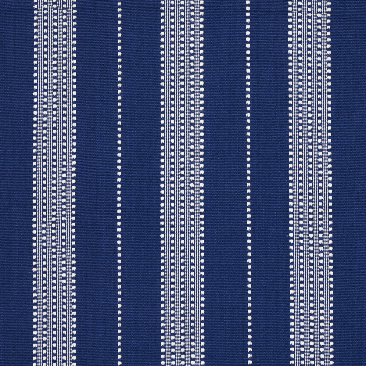 Navy blue fabric featuring vertical white dotted stripes in a woven pinstripe pattern.
