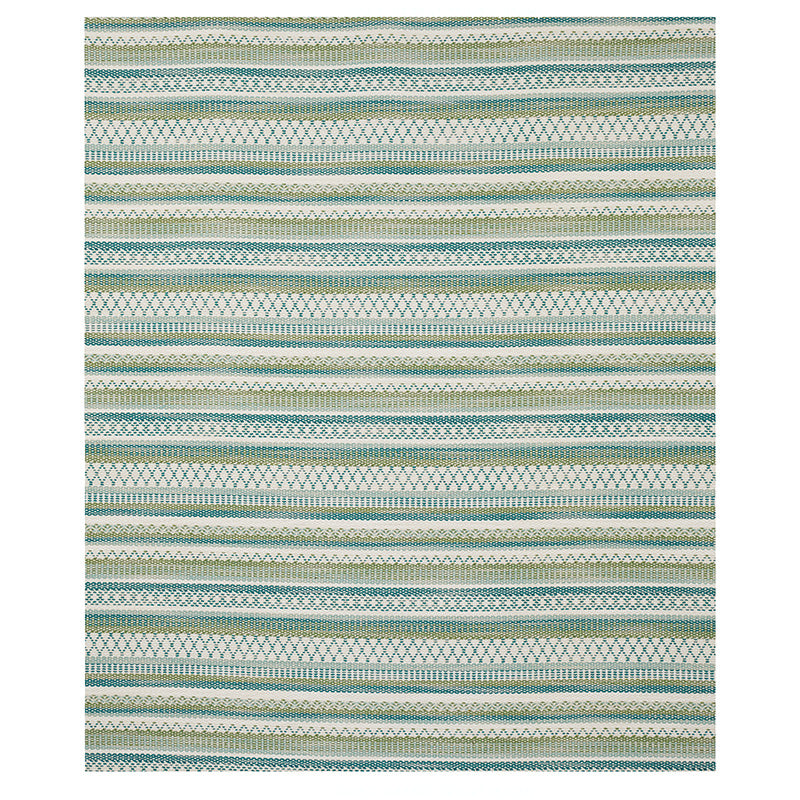 Woven tribal striped rug in teal, blue and beige with geometric diamonds; boho style, soft texture.