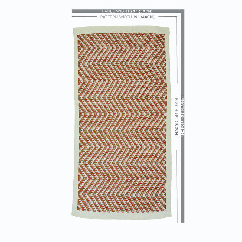 Rectangular rug with brown and cream zigzag chevrons and a light beige border.