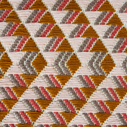 Geometric triangular woven textile in mustard, pink, gray and ivory; hand-woven brocade-patterned textile.
