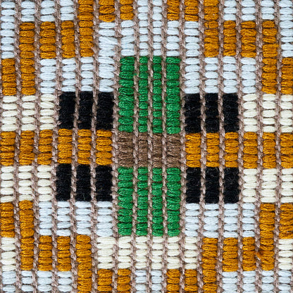 Close-up of woven textile with mustard yellow, white, black and green yarns in a geometric grid pattern.