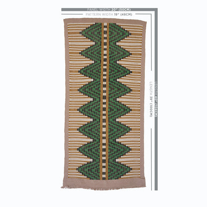 Rectangular woven rug with green zigzag chevron pattern on tan beige background; fringed ends, boho tribal style