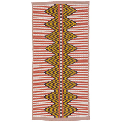 Long woven fabric with pink base and white stripes, featuring bold yellow zigzag diamonds outlined in black along a center line.