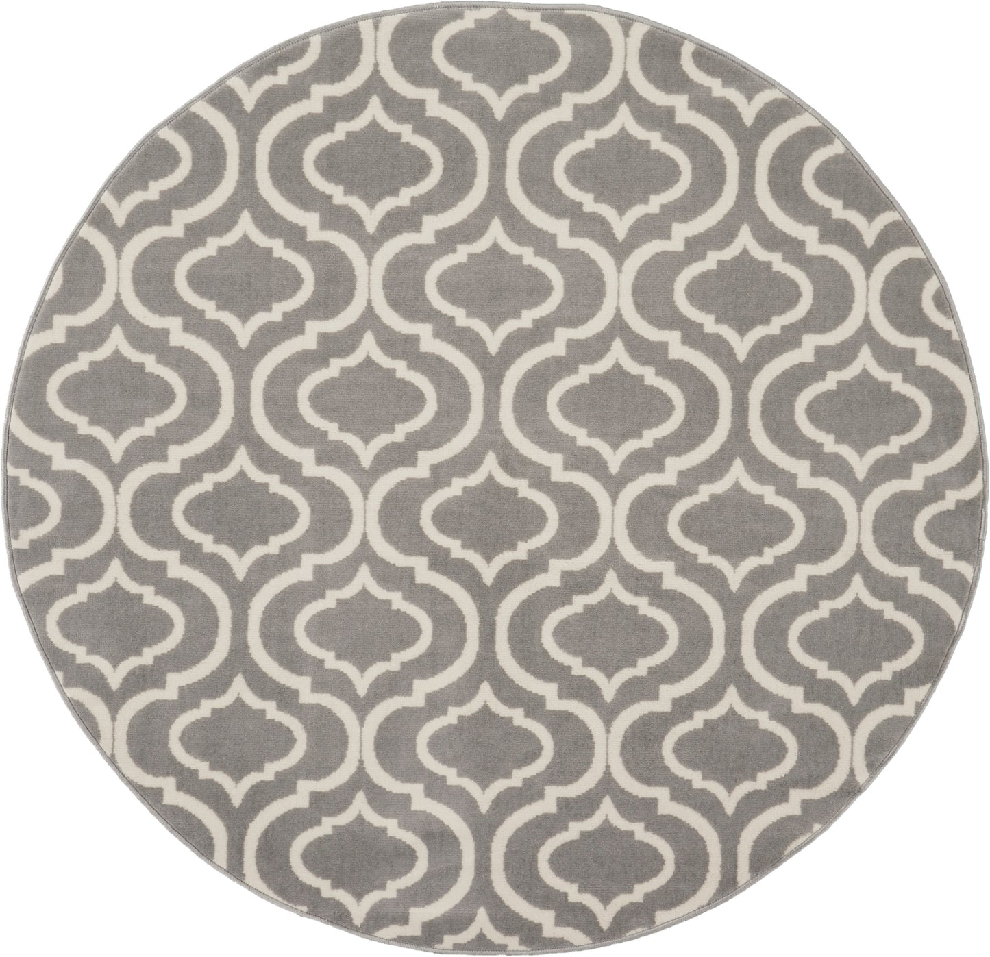 Round grey rug with white Moroccan trellis pattern; soft textile floor decor.