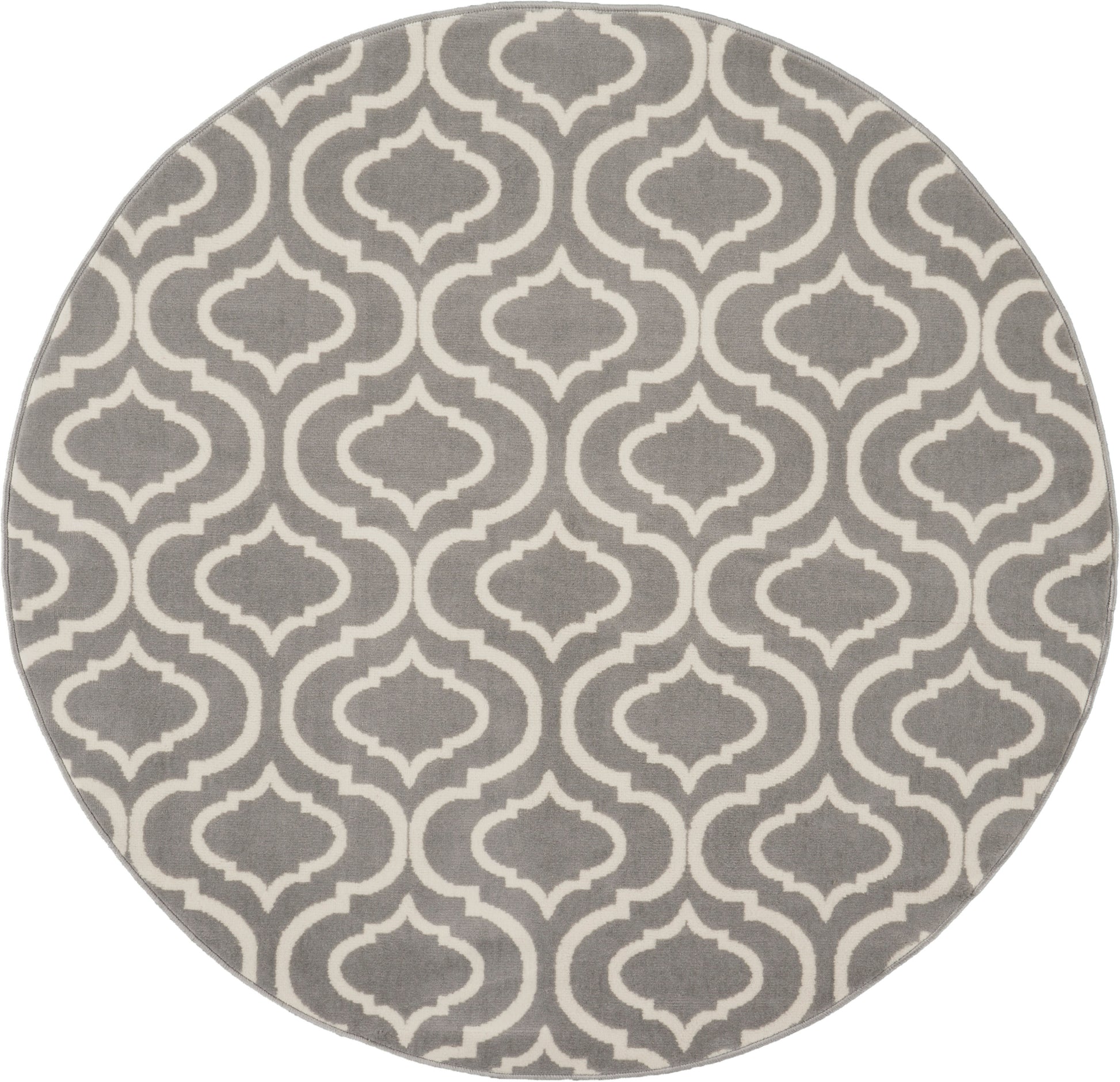 Round grey rug with white Moroccan trellis pattern; soft textile floor decor.