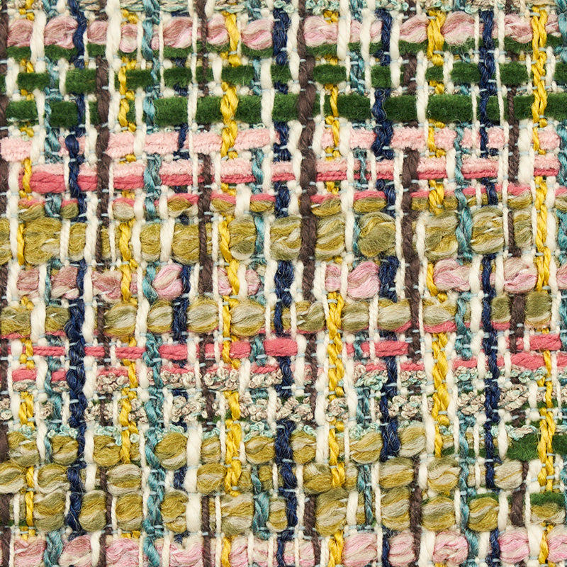 Colorful woven boucle fabric swatch with pink, green, yellow, blue threads in a textured tweed grid.