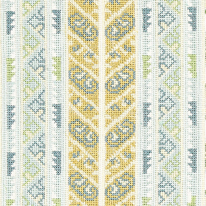 Woven textile with vertical stripes: mustard yellow central column with blue floral motifs, pale blue and green accents.