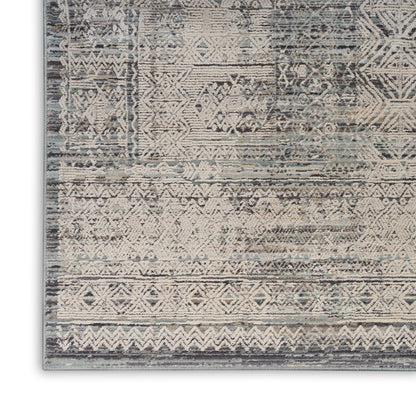 Distressed blue-gray and beige geometric runner with tribal diamonds and a vintage wash.