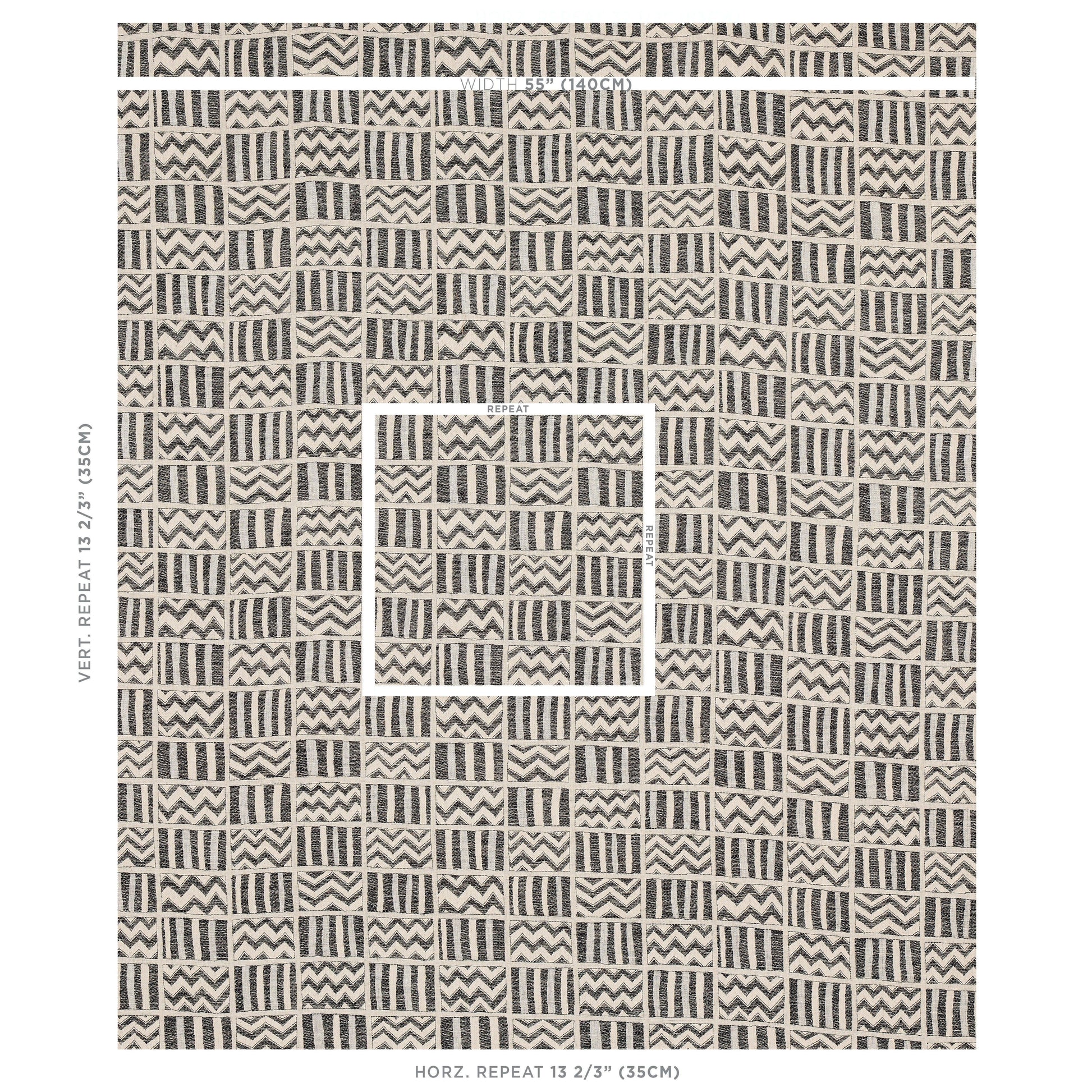Beige and black geometric woven rug with repeating square blocks of chevrons and stripes; versatile rug or throw.