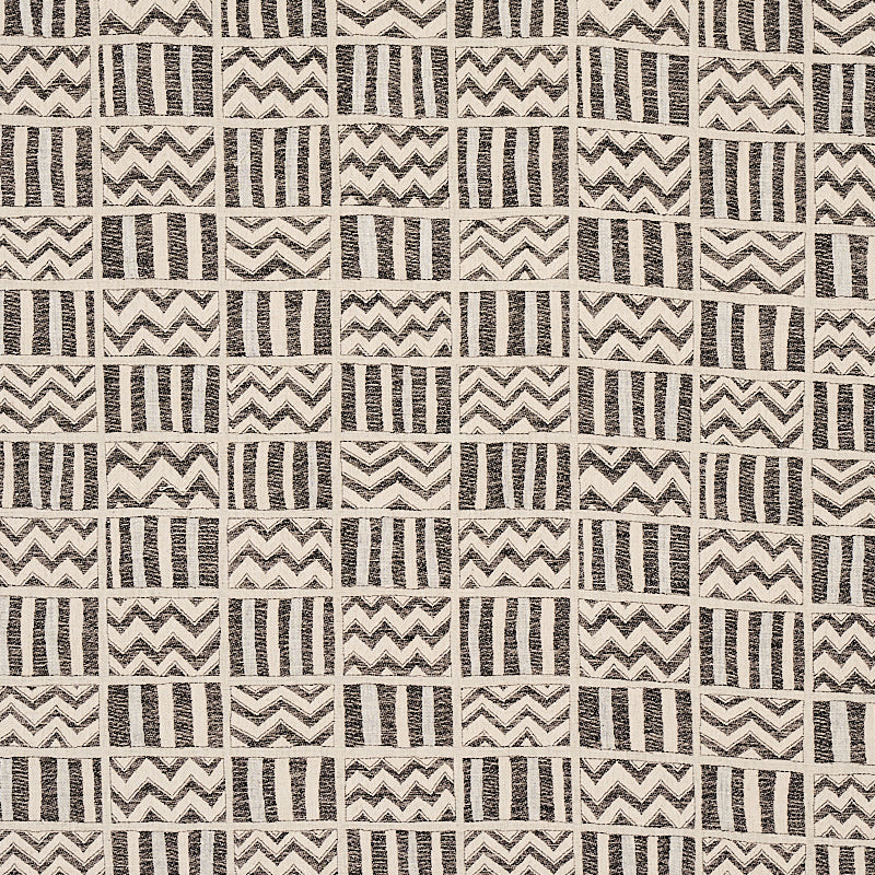 Beige woven textile pattern with square blocks of charcoal zigzag chevrons and vertical stripes.