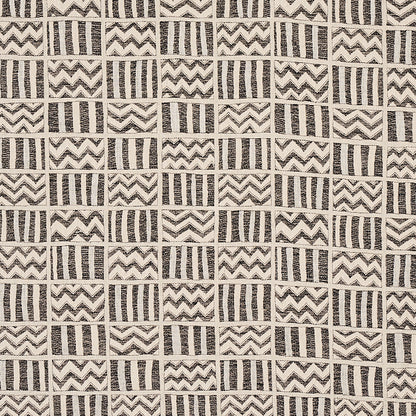 Beige woven textile pattern with square blocks of charcoal zigzag chevrons and vertical stripes.