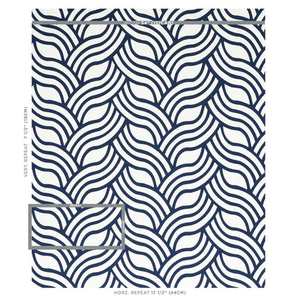 Navy and white wave-pattern textile with flowing curved lines; ocean-inspired fabric swatch with a small inset frame.