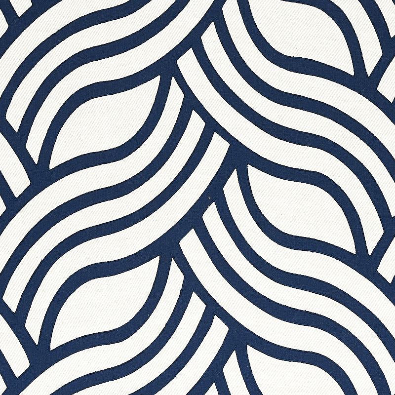 Navy blue curved lines weave across cream fabric in an abstract wavy stripe pattern.