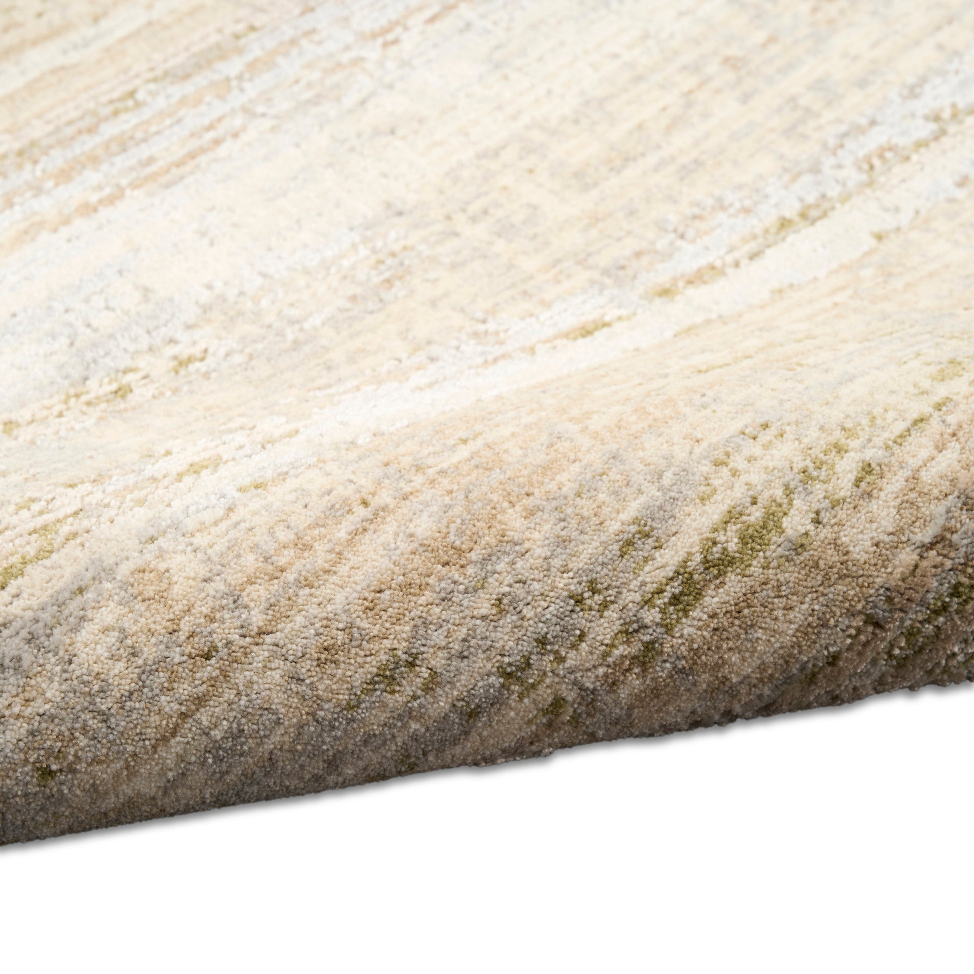 Beige and cream textured area rug with subtle sage green accents; plush pile and rolled edge for modern decor.