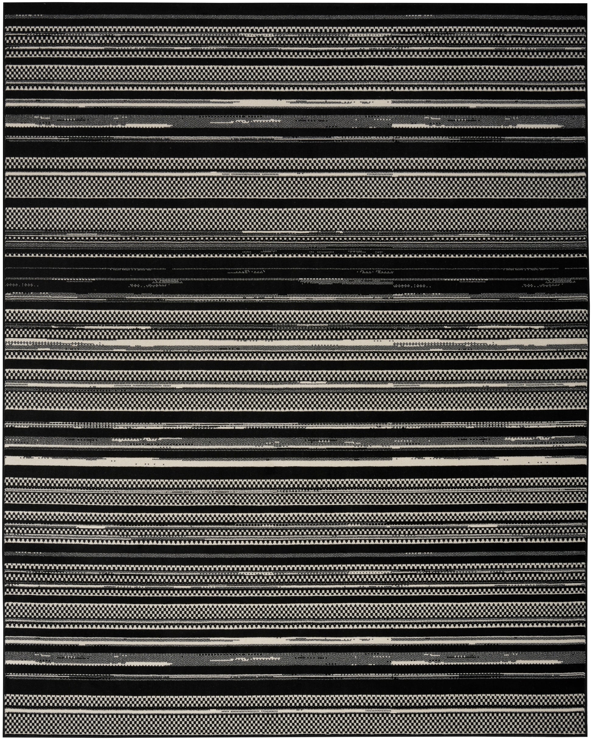 Woven black and white striped rug with alternating solid, checkered and textured bands.