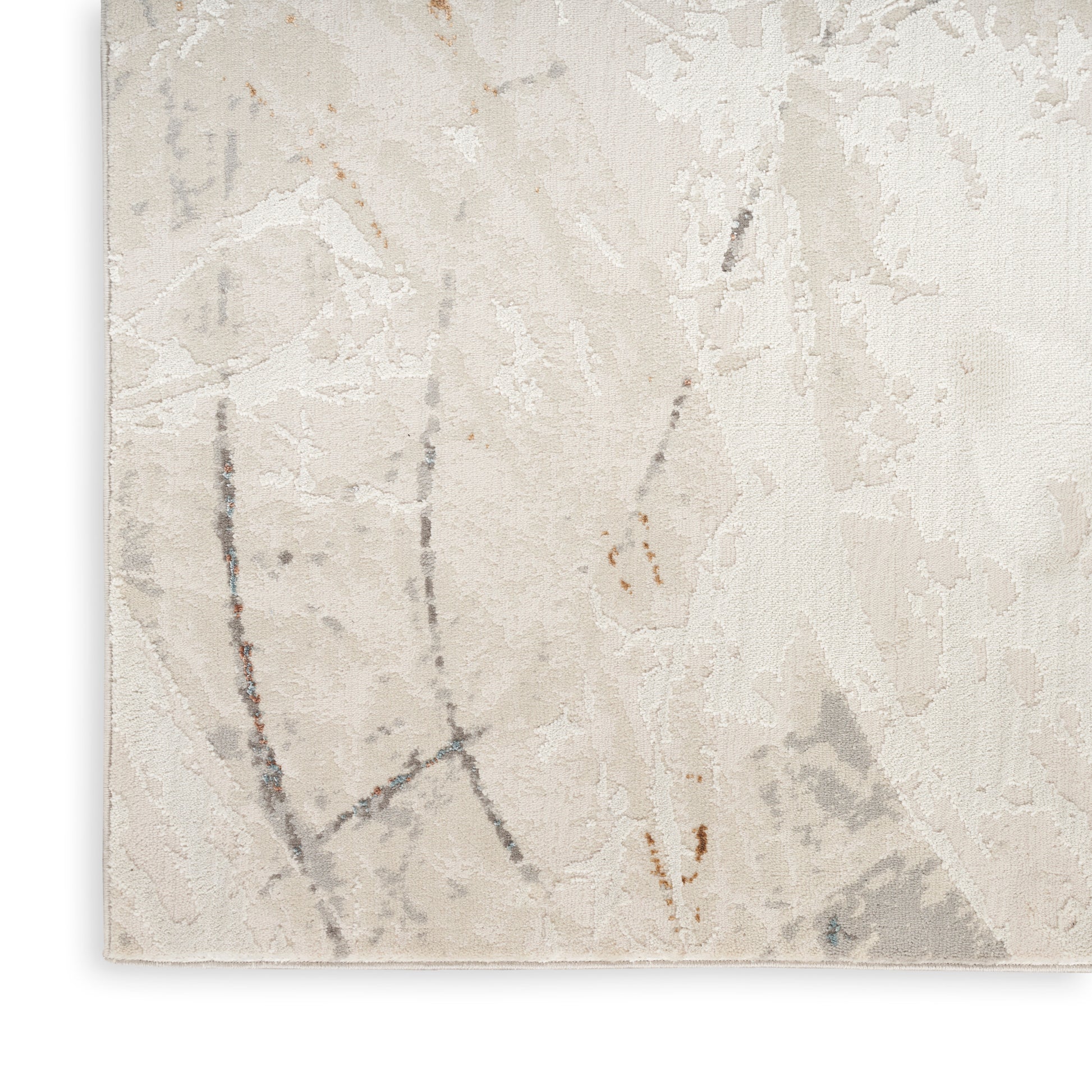 Cream-beige abstract rug with soft texture and pale grey and rust accents, subtle linear pattern.