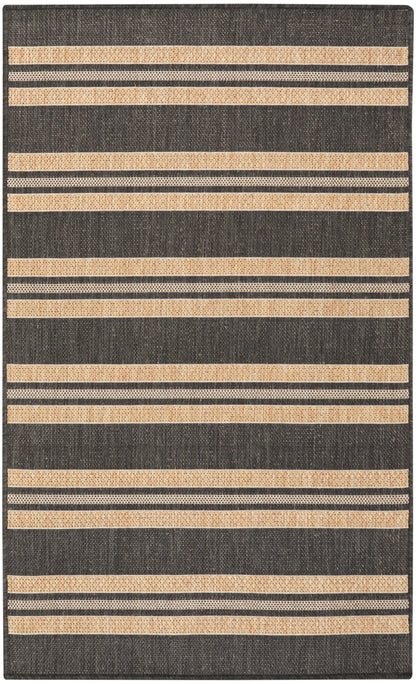Dark charcoal rug with wide beige woven stripes and thin dotted beige lines in a horizontal striped pattern.