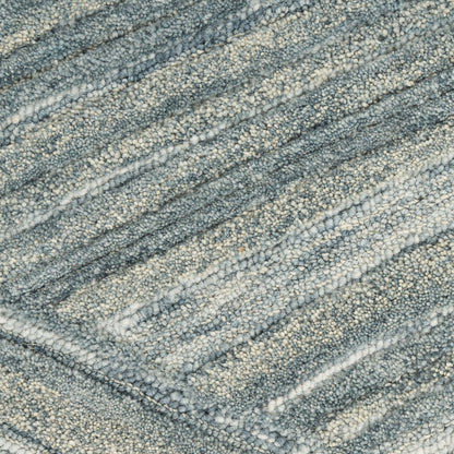 Blue-gray loop-pile rug with diagonal striped texture and speckled pattern.