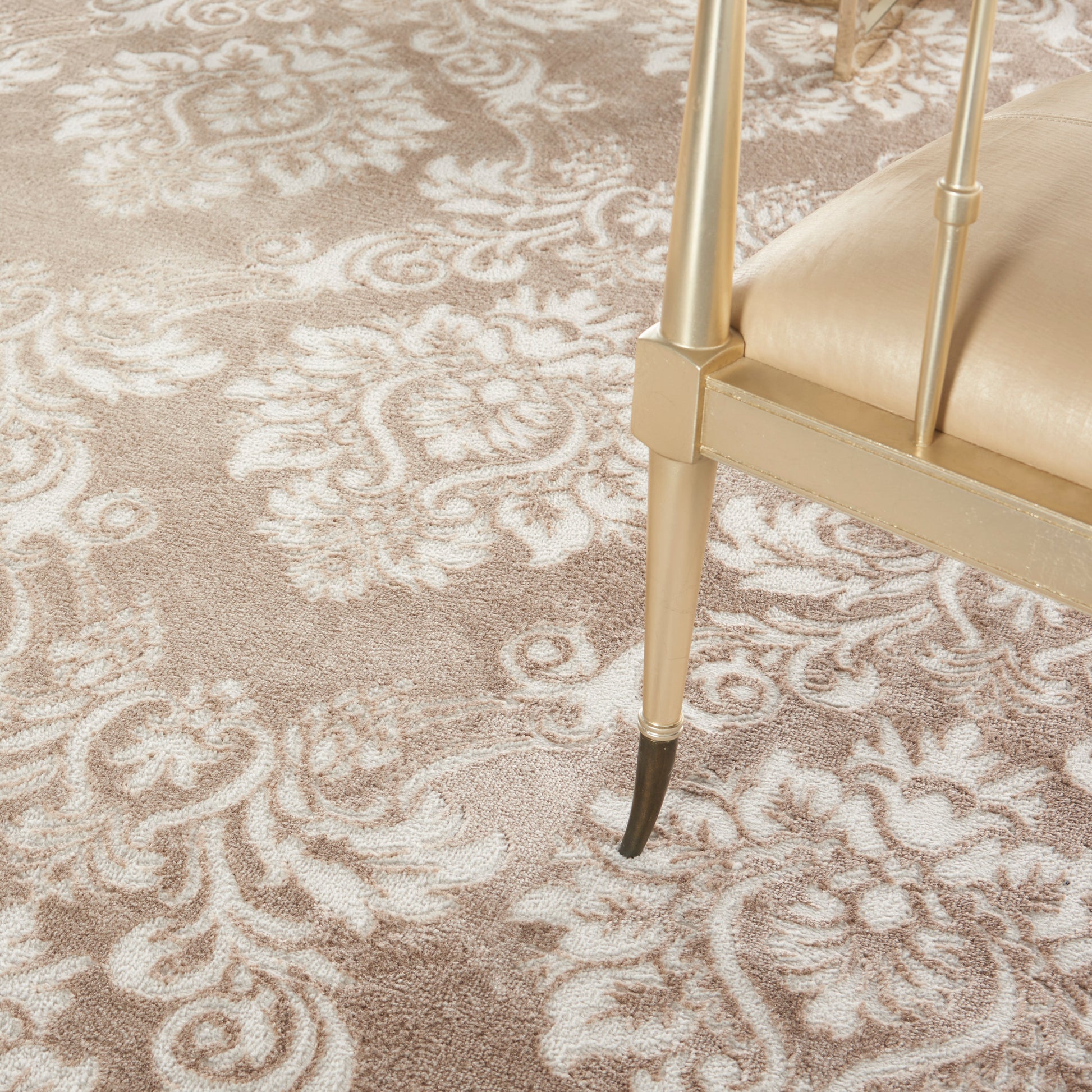 Cream ornate floral patterned rug in vintage style, size 9' x 12'.