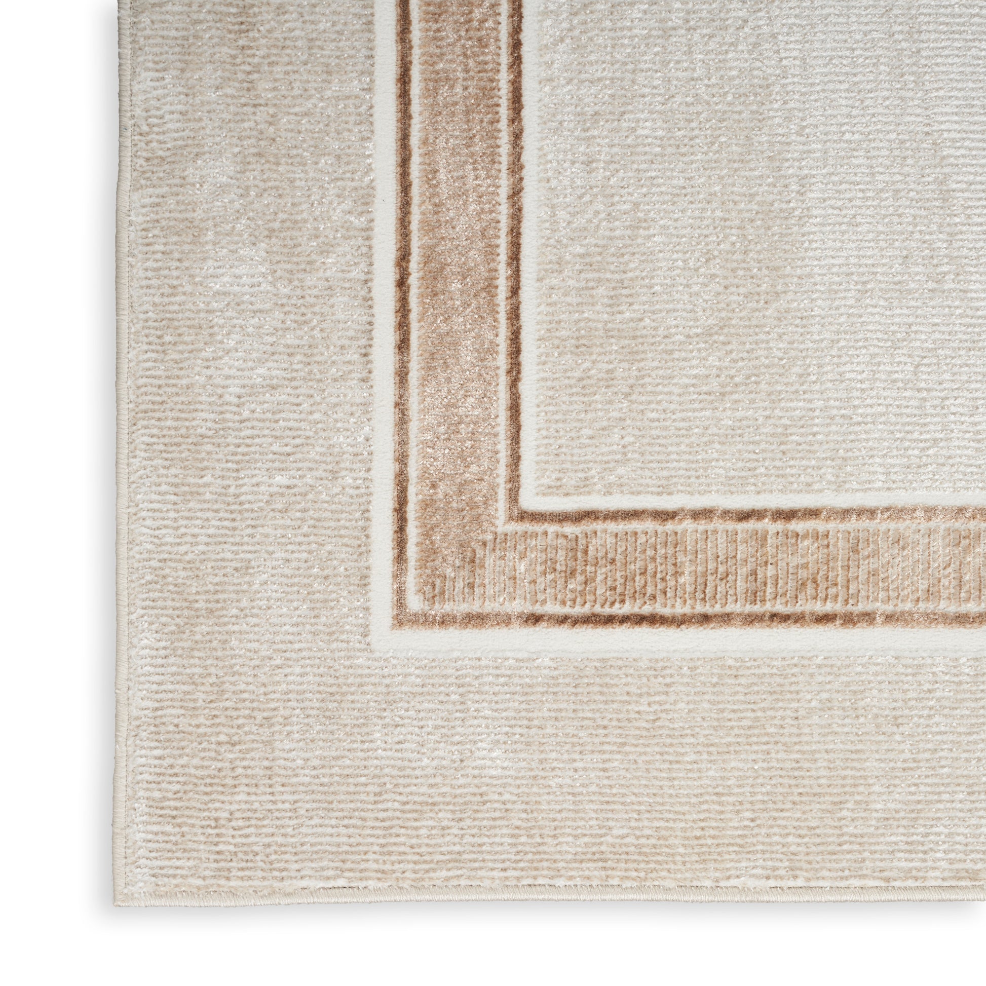Cream and beige area rug with a brown inner frame border and textured woven surface.