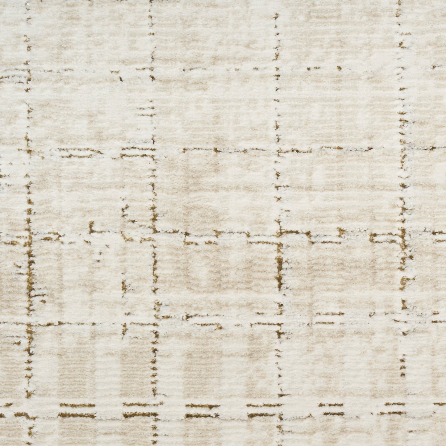 Cream-beige rug with a soft, textured pile and faint brown grid pattern for neutral decor.