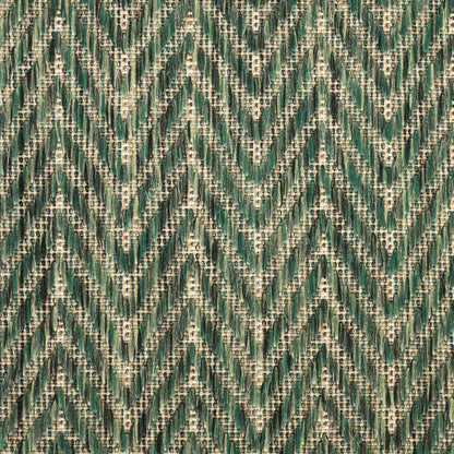 Green chevron zigzag woven fabric with cream specks; emerald and teal tones for upholstery or clothing.