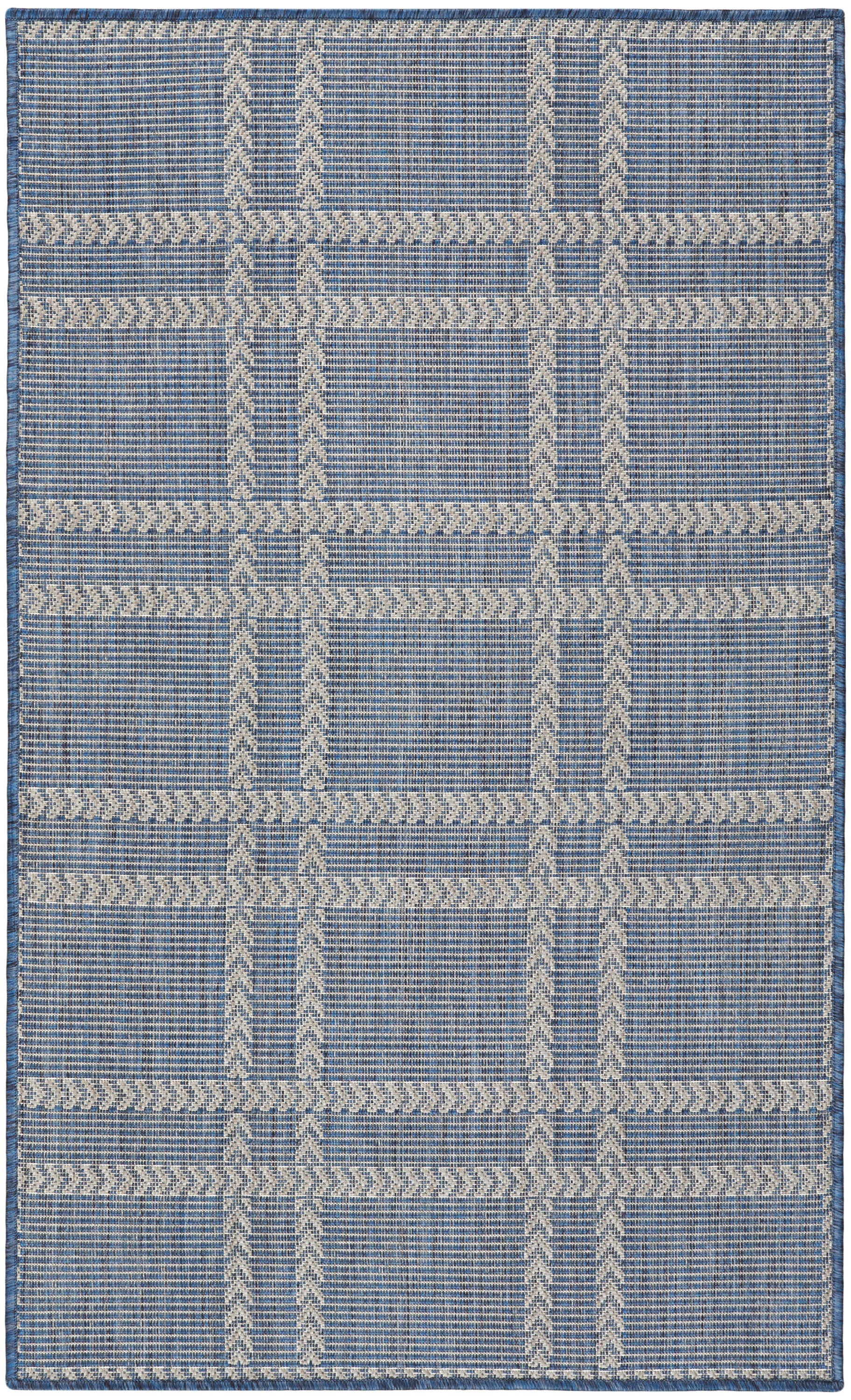 Blue and ivory woven flat-weave rug with geometric grid and chevron stripes; rectangular, casual living room or entryway.