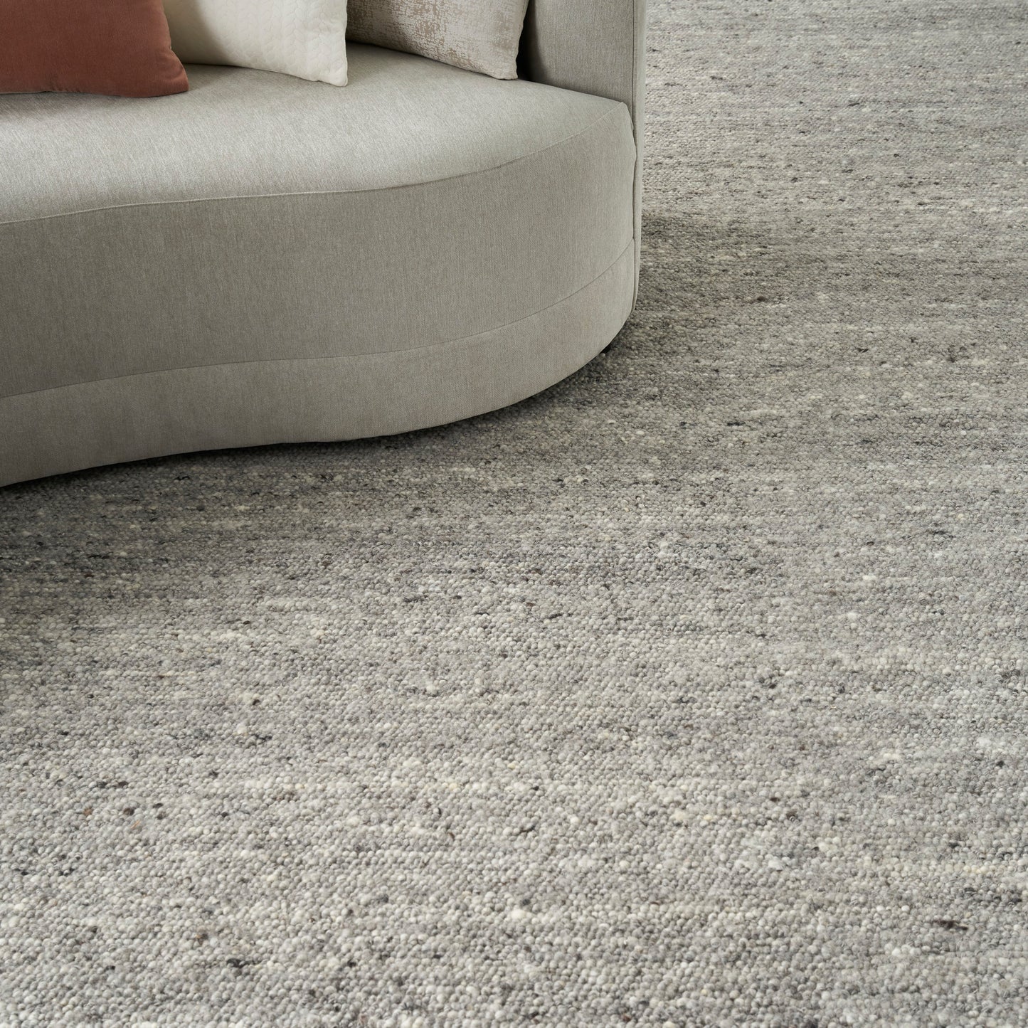 Neutral textured Farmhouse-style rug in soft gray tones.