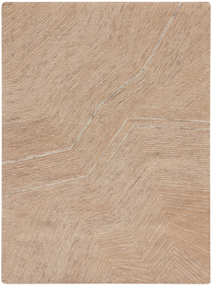 Warm beige rug with a subtle chevron parquet-inspired pattern.