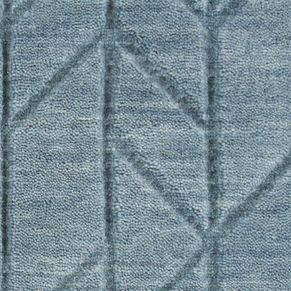 Blue textured rug with looped pile & geometric diamond pattern (2' x 3').