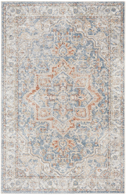 Rectangular machine-made rug in pale blue, ivory, and rust with a central floral medallion and ornate border.