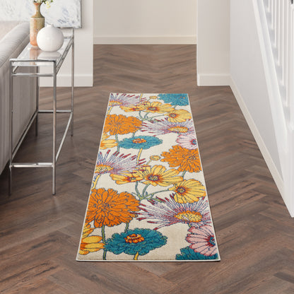 Long rectangular floral runner rug with bright orange, teal and yellow blooms on cream background; modern hallway decor.