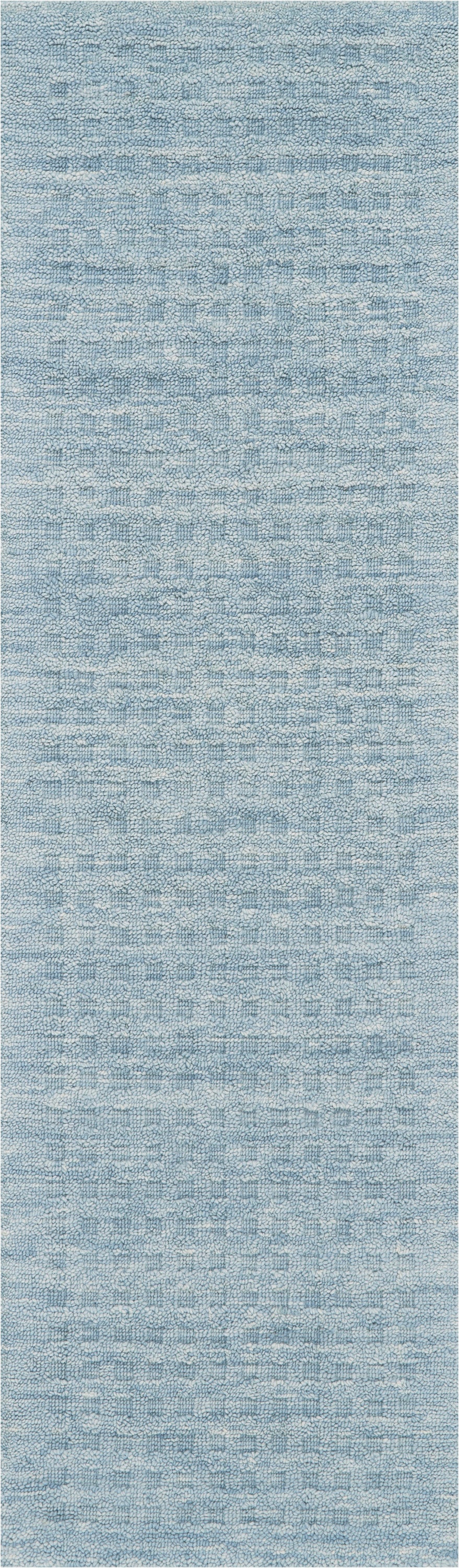Light blue textured woven rug with a subtle grid pattern; soft, versatile floor decor.