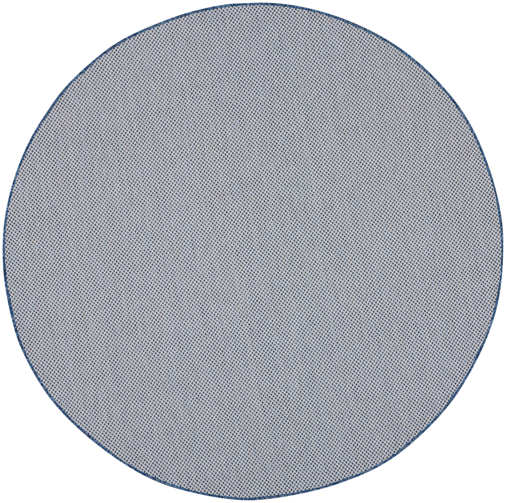 Round blue-gray rug with a fine dot pattern and navy edge; circular textile item.