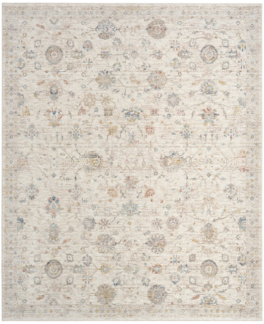 Cream vintage-style area rug with faded floral medallions in pale blue, taupe and gray; rectangular.