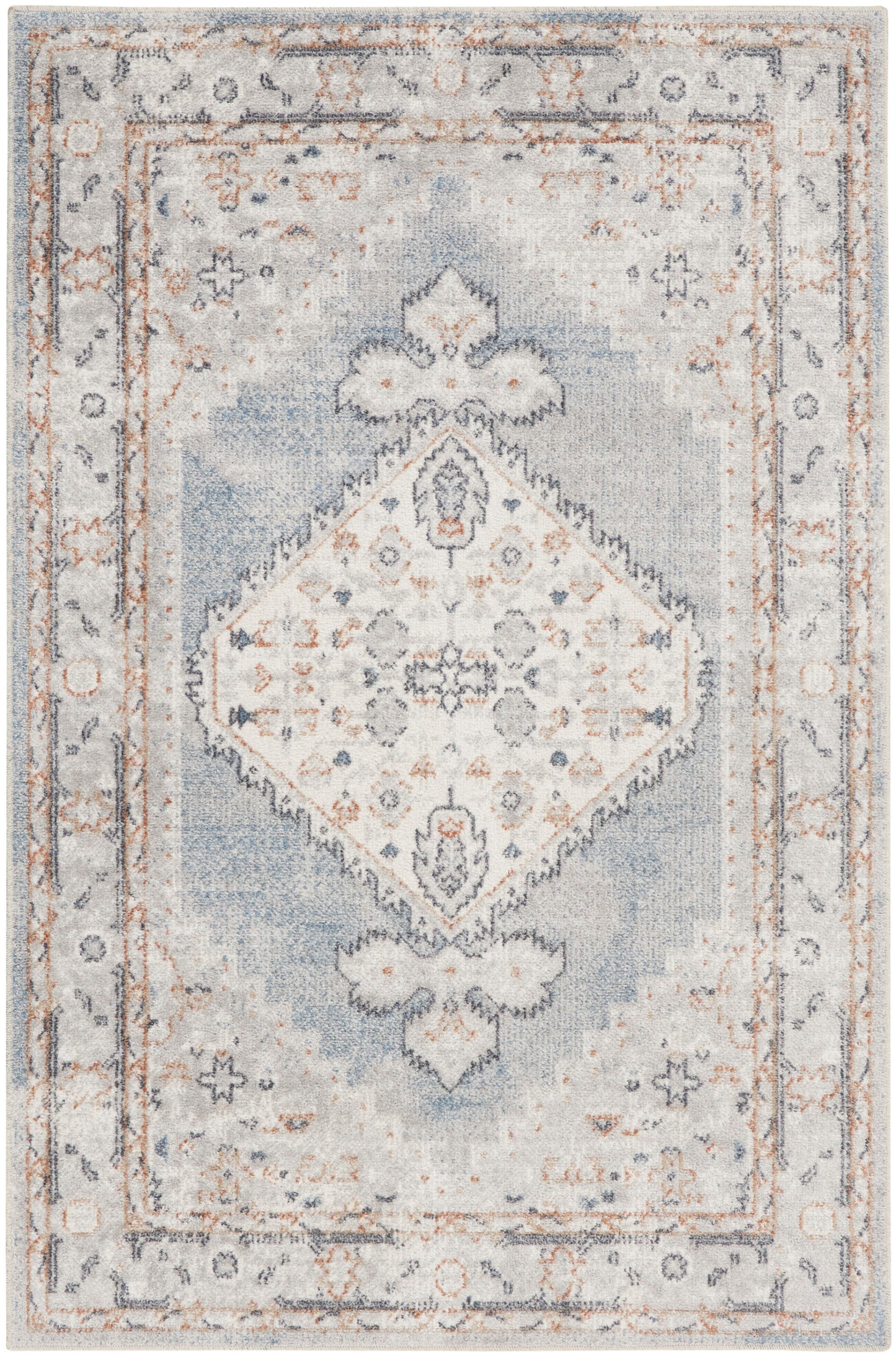 Blue and ivory distressed area rug with a central diamond medallion and ornate border.