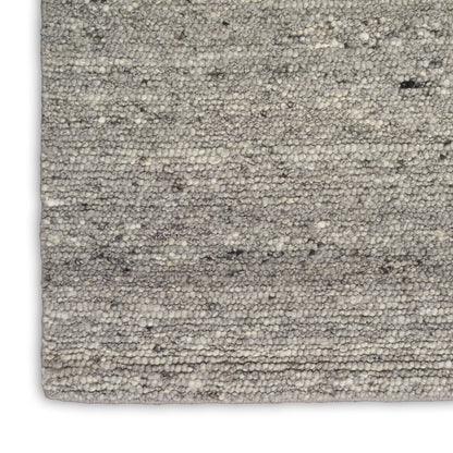 Beige-gray loop-pile rug close-up; textured, neutral, modern decor for living spaces.