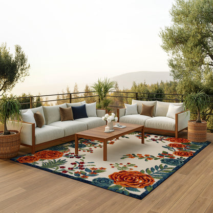 Outdoor rug with a vibrant floral pattern on a wooden deck