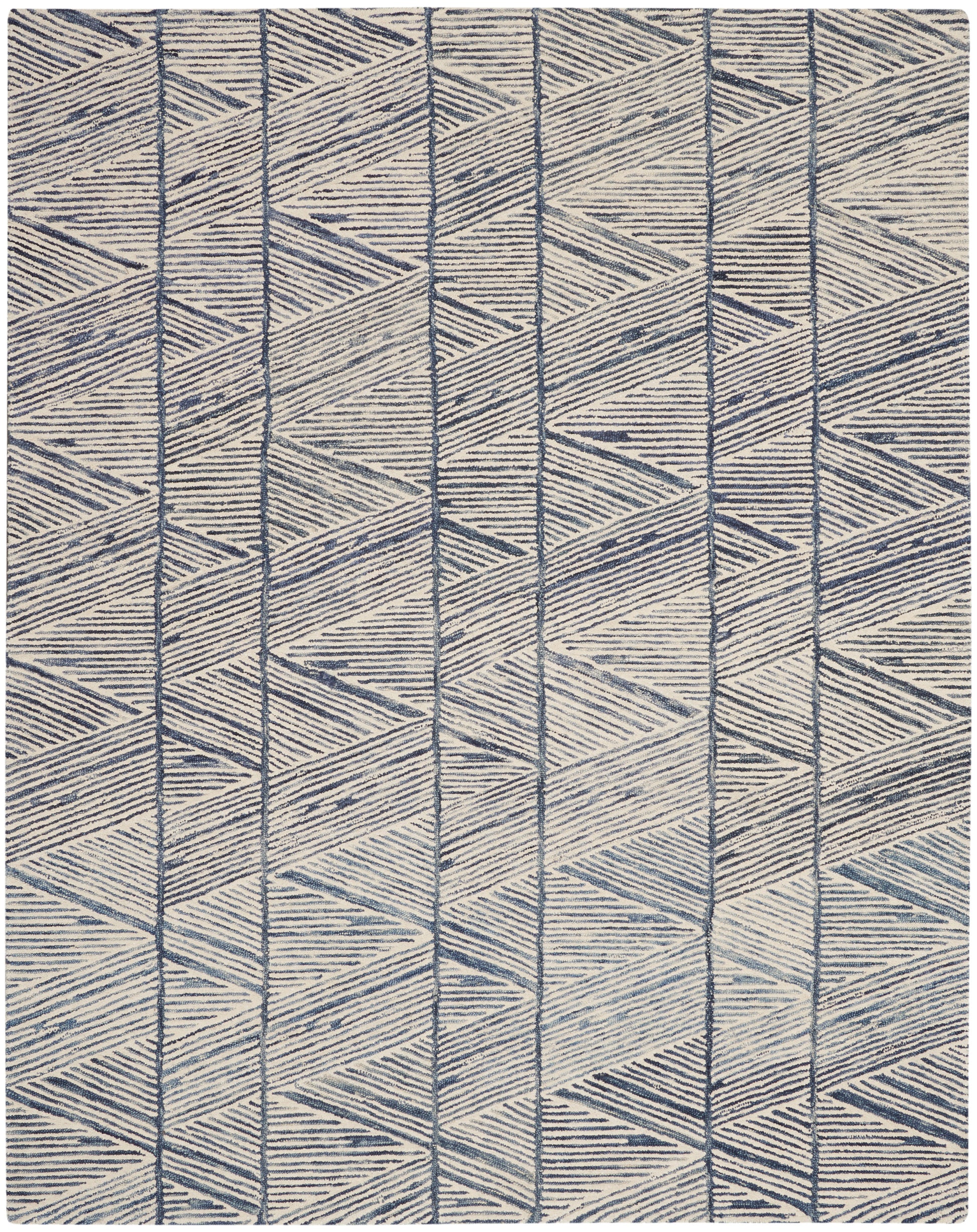 Beige woven rug with navy geometric chevron and diamond pattern.