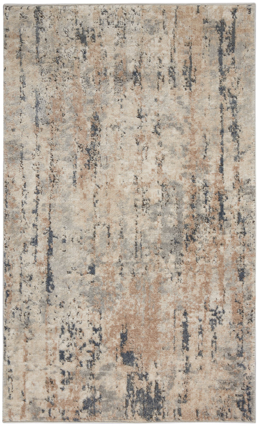 Abstract distressed area rug in beige, tan, cream with blue-gray vertical streaks.
