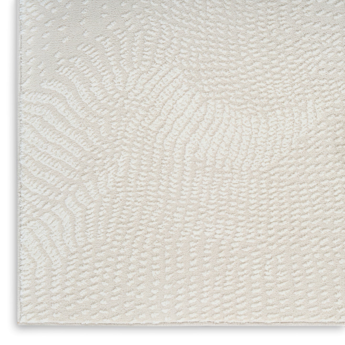 Cream textured area rug with a soft swirl pattern and plush pile for cozy, modern living spaces.