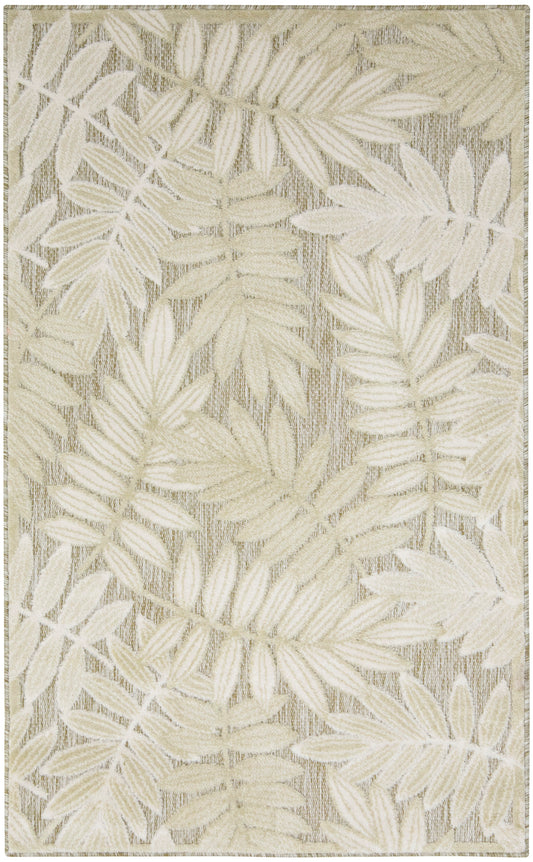 Beige and ivory woven rug with palm leaf pattern; neutral tropical design, rectangular area rug for living spaces.