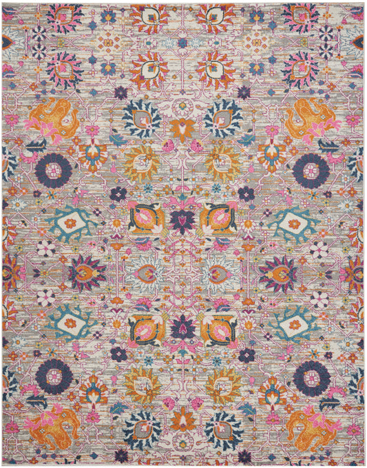 Colorful oriental rug with pink, orange, teal and purple florals on a cream background; intricate symmetrical pattern.