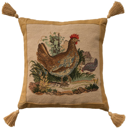 Square tapestry pillow with a rooster motif, countryside scene; gold velvet border and tassels at all corners.