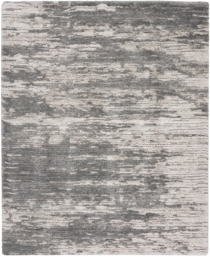 Abstract gray and ivory rug with distressed pattern; modern area rug for living room.